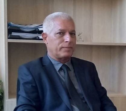 Проф. д. ик. н., д. пол. н. Карим Фахир Наама